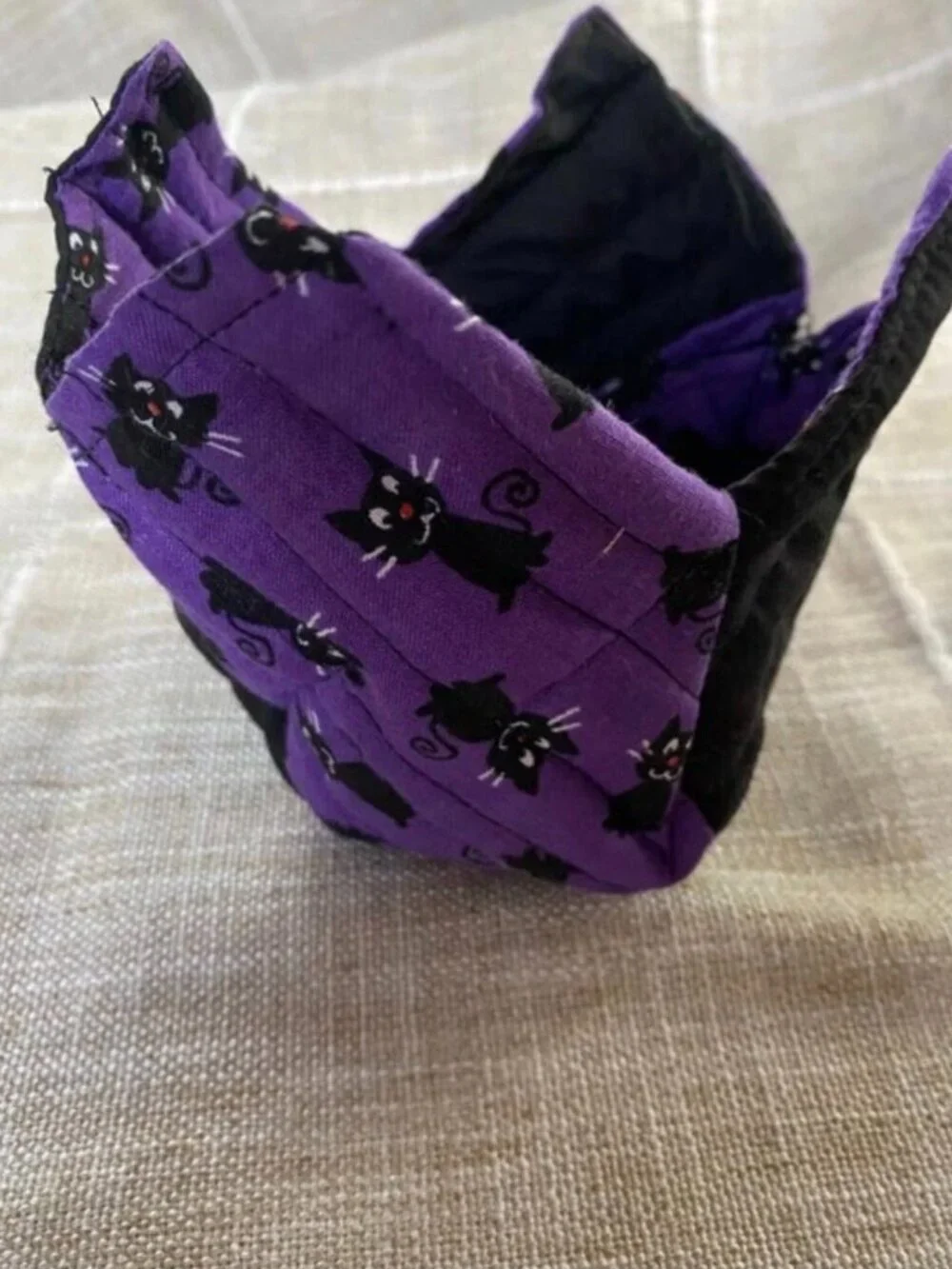 2 Fabric baskets, black cats, and Halloween placemat centerpiece